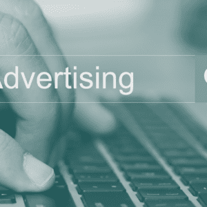 Person searching for advertising on laptop