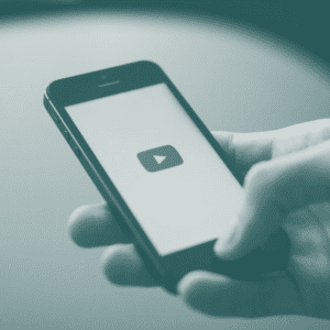 Smartphone with YouTube logo on screen